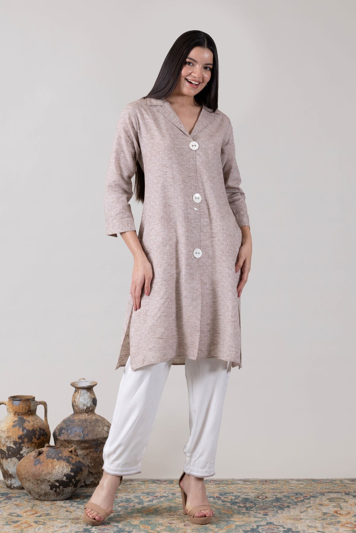 KUDIORY Women Beige Solid Asymmetrical Hem Kurta with White Palazzos