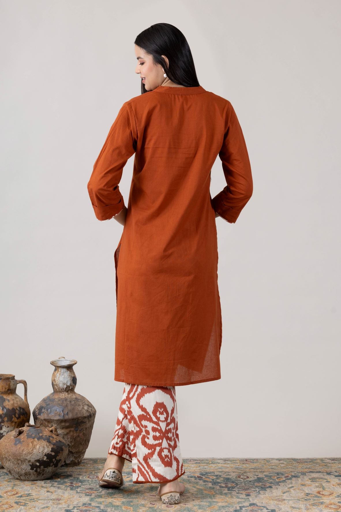 KUDIORY Women’s Rust Solid Kurta with White & Rust Printed Wide-Leg Palazzos