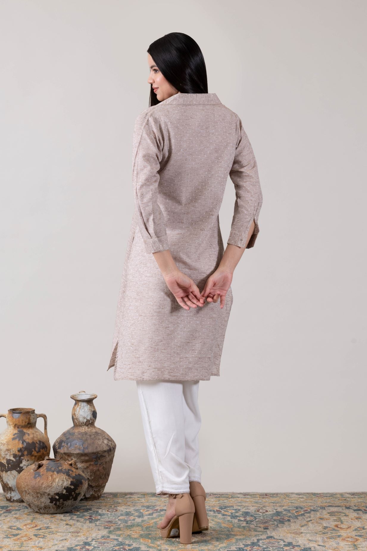KUDIORY Women Beige Solid Asymmetrical Hem Kurta with White Palazzos