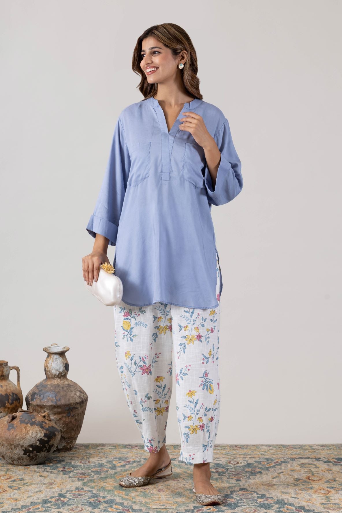 KUDIORY Women’s Light Blue Solid Short Kurta with White Floral Printed Straight Palazzos